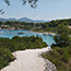 A gravel path between Zdrilca and Mlini bays with a view over Zdrilca